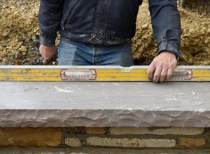 Exterior wall leveling